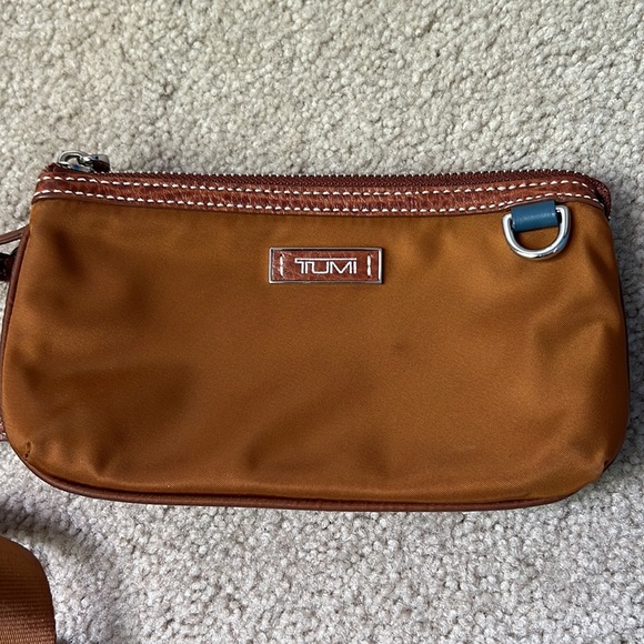 Tumi wristlet with crossbody strap. - Picture 8 of 8